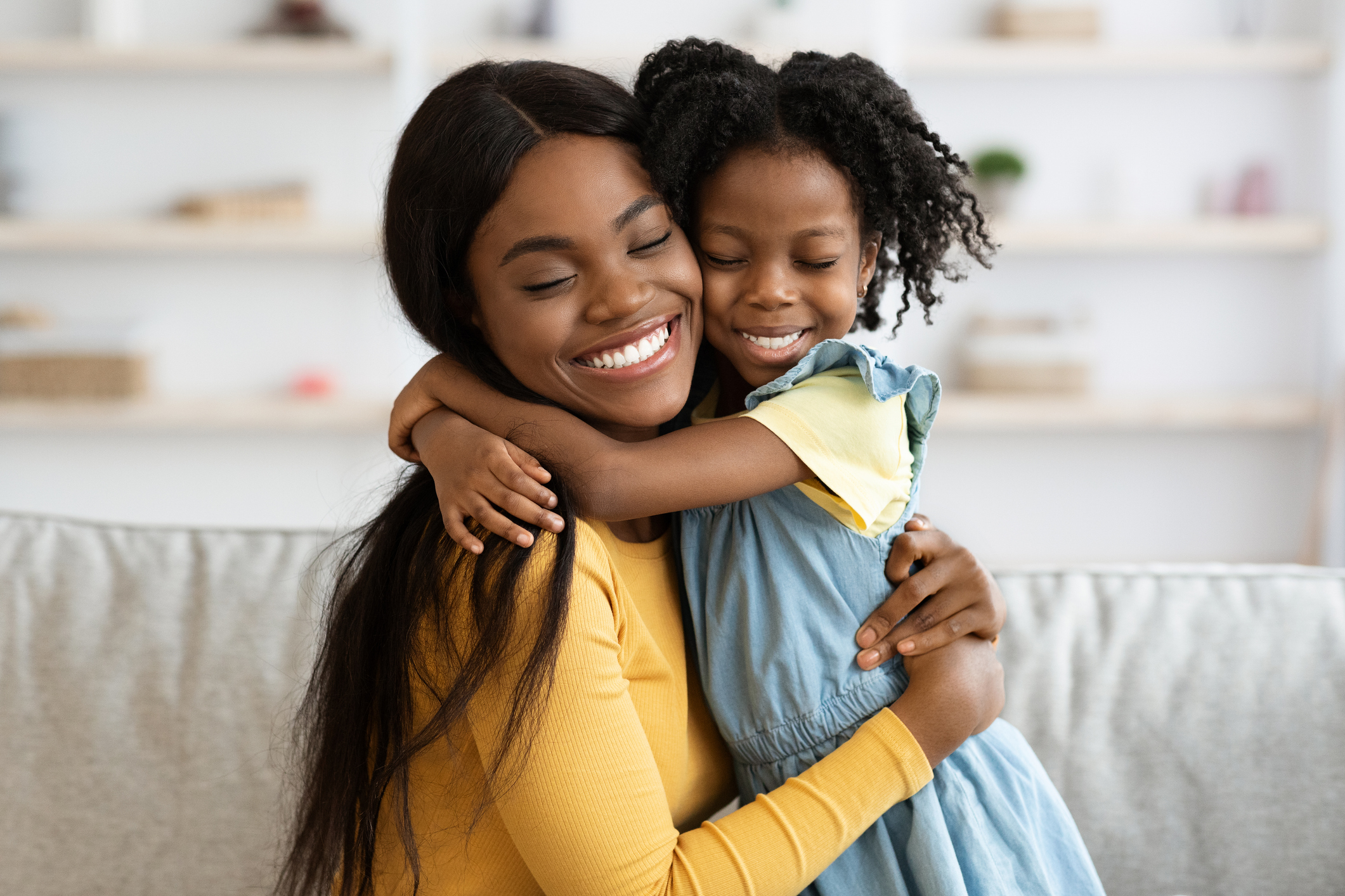Mother Daughter Love. Happy Black Woman Hugging With Her Child At Home, Loving African American Family Of Two Mom And Female Kid Bonding And Enjoying Spending Time With Each Other, Copy Space